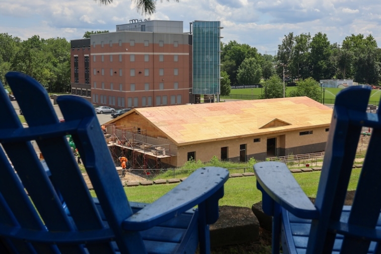 The Fieldhouse under construction as seen from a hill above the site