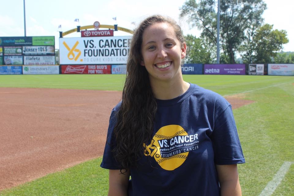 HFU alum Casey Borish standing on a minor league baseball field