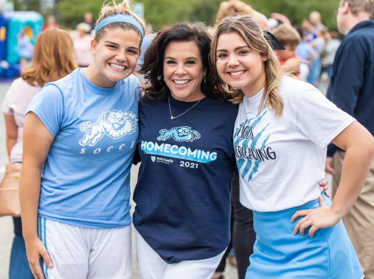 Mom and her daughters at Homecoming 2021