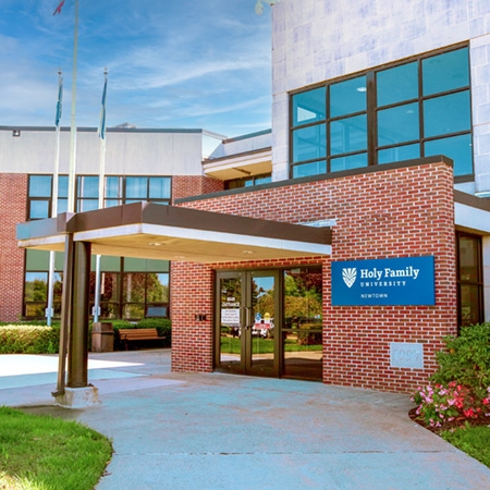 The exterior of the entrance to HFU's Newtown East campus building