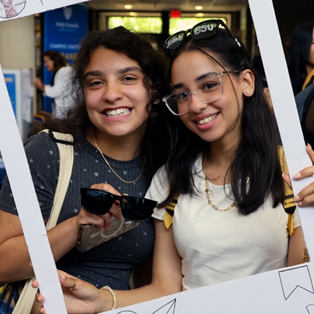 Two HFU students smiling and posing