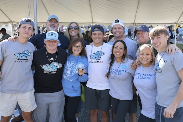 A group of students, parents and alum celebrating at TigerFest Homecoming