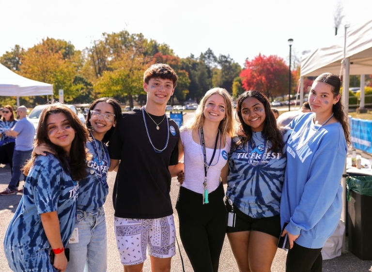 Six students outside celebrating at the TigerFest homecoming festivities
