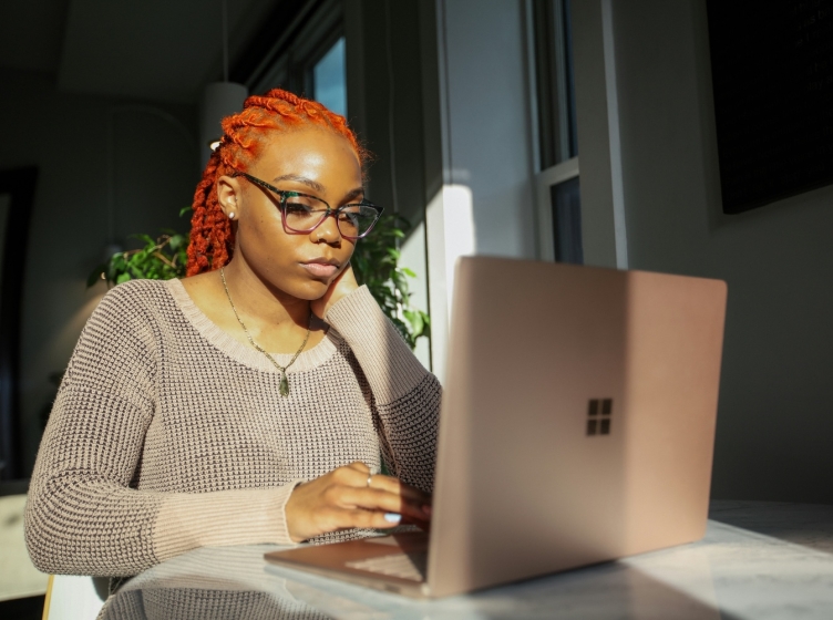 Female student working on laptop